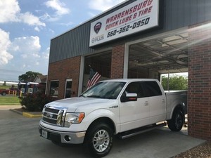 Warrensburg Quicklube And Tire Logo